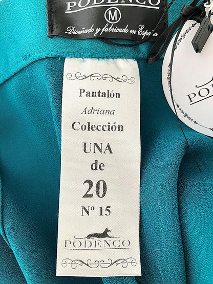 Pantalón buggy Adriana – Elegancia fluida en verde esmeralda